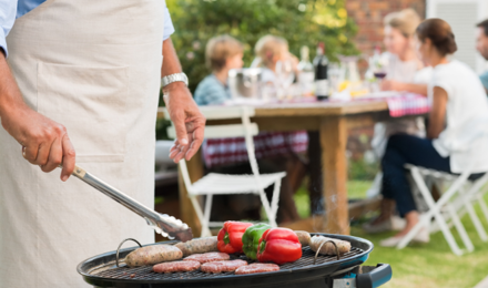 A person cooking on a barbecue