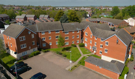 An aerial shot of various homes in the sunshine