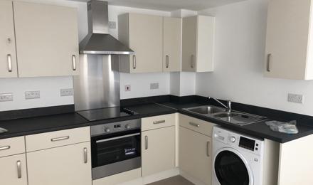 A new kitchen in beige monochrome colours