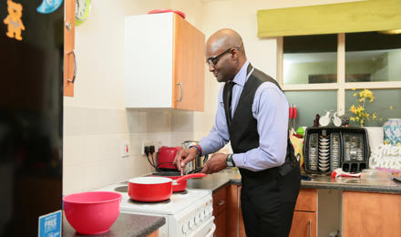 A man cooking in his kitchen