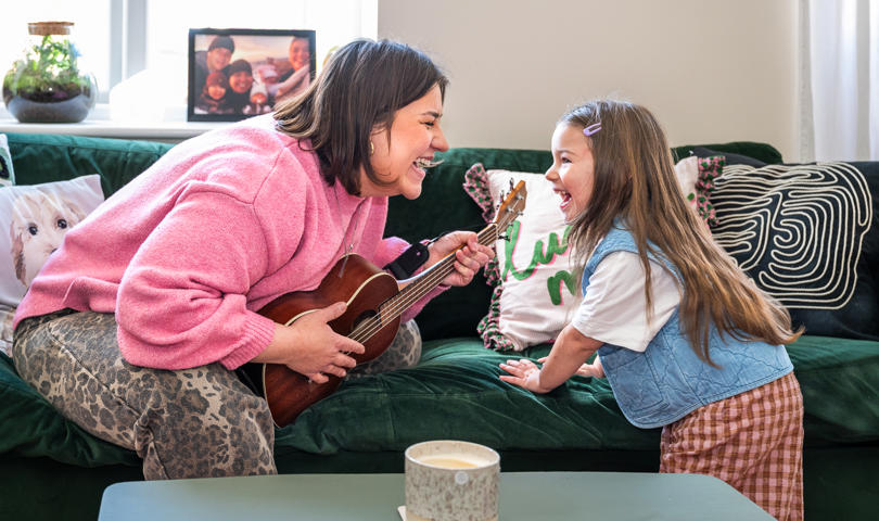 A Mother And Daughter Making Music