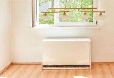 Storage heater in a bright, empty room