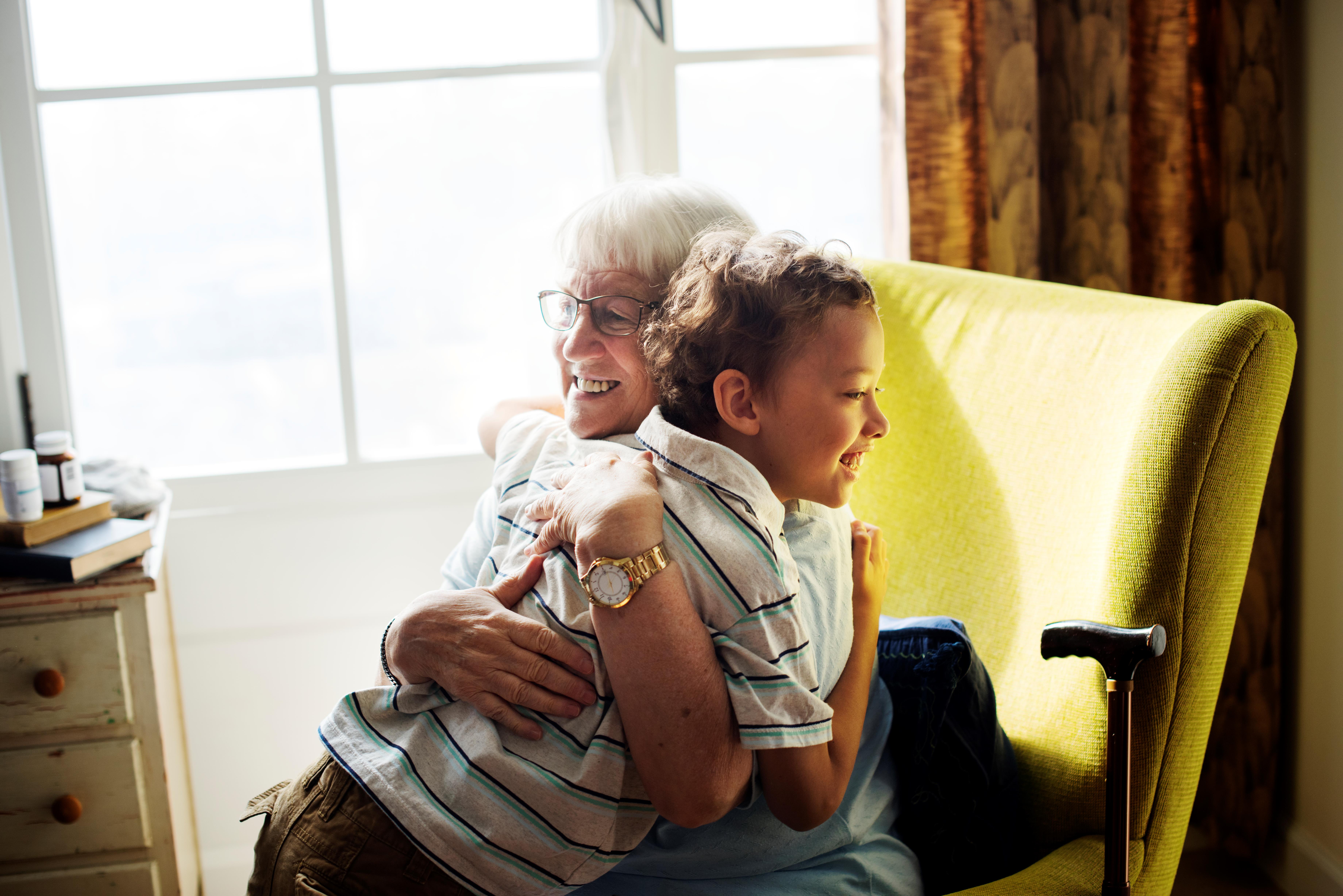 A grandma hugging her grandson