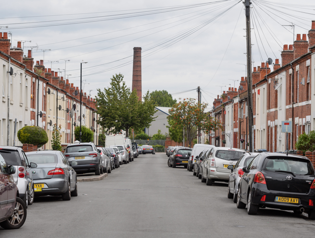 Oliver Street in Coventry, looking straight down the road with cars and houses either side