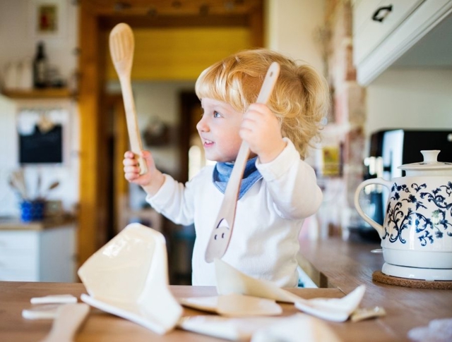 A young child in the kitchen