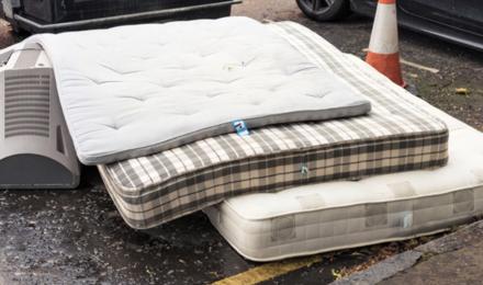 Discarded mattresses on the roadside